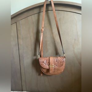 Faux leather tooled crossbody purse